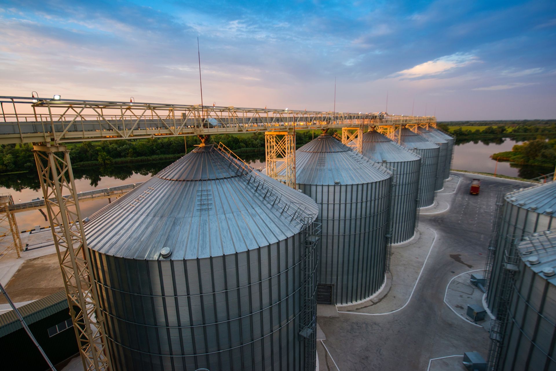 metal tanks for storage of grain (elevator) near the river metal tanks for storage of grain (elevator) near the river